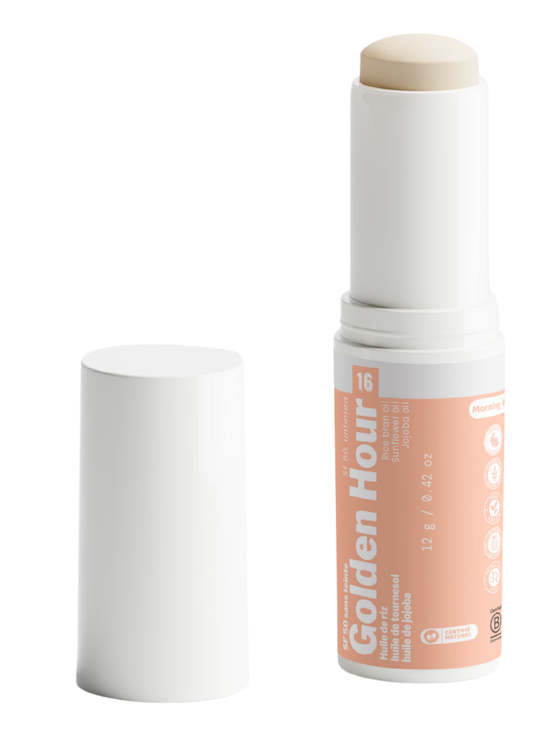 Packshot détouré de Golden Hour n°16 de Luminesse Paris, stick solaire SPF 50 de 12 g dans un tube blanc avec étiquette pêche. Le stick beige est sorti du tube et le capuchon blanc est posé à côté ; la mention Morning et les huiles de riz, tournesol et jojoba sont visibles sur le packaging.