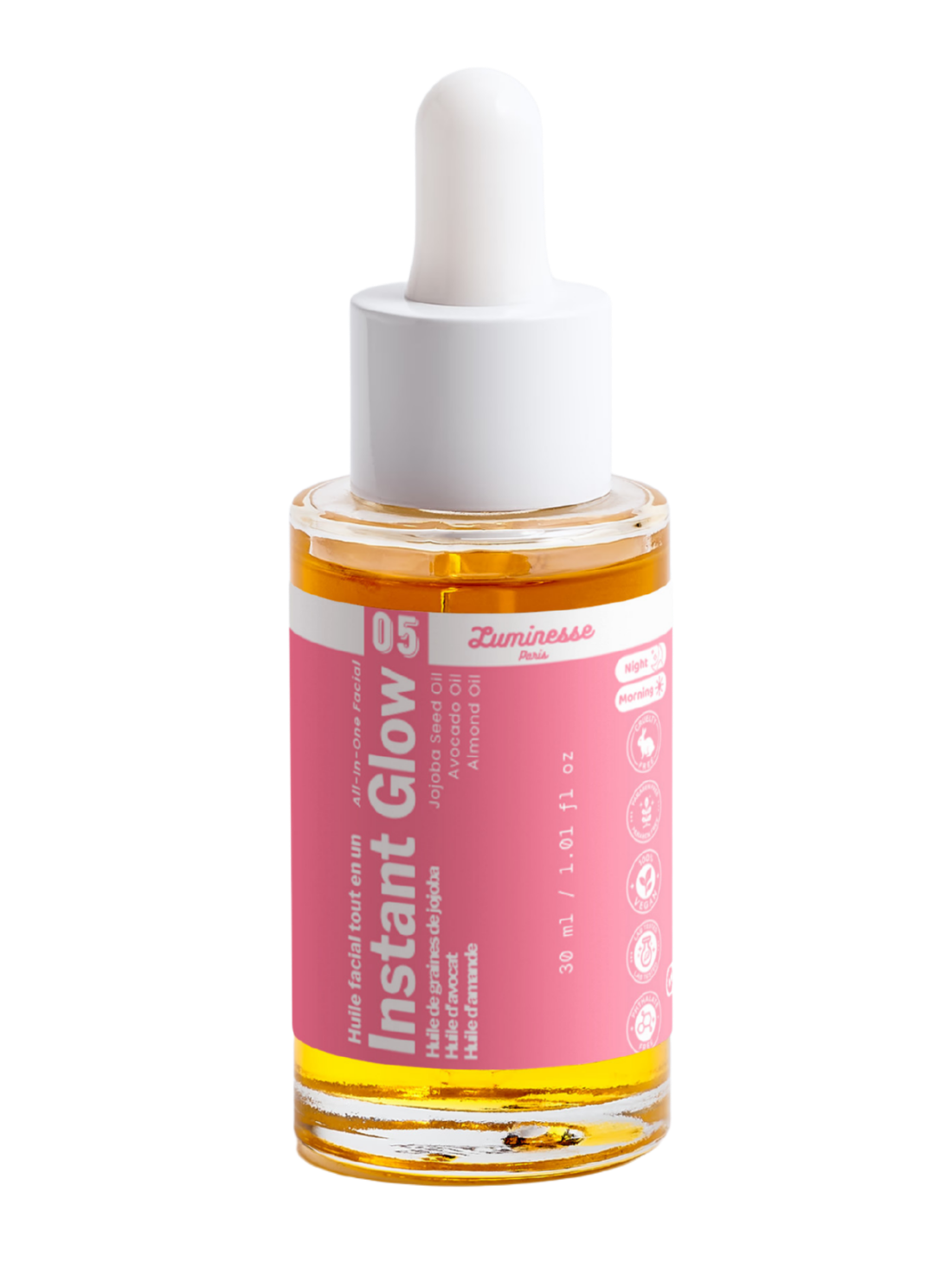 Packshot détouré d’Instant Glow n°05 de Luminesse Paris, huile visage en flacon compte-gouttes de 30 ml contenant une huile dorée. L’étiquette rose mentionne notamment les huiles de jojoba, avocat et amande ainsi que les pictogrammes Morning et Night.