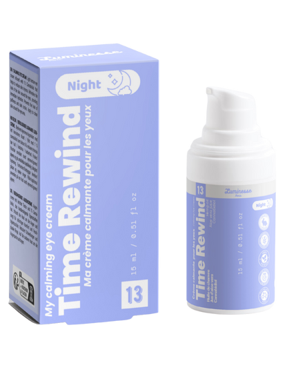 Packshot de Time Rewind n°13 de Luminesse Paris avec son étui lavande et son flacon pompe blanc de 15 ml. Le produit et la boîte sont présentés côte à côte sur fond transparent ; la mention Night et le libellé « crème calmante pour les yeux » sont visibles sur le packaging.